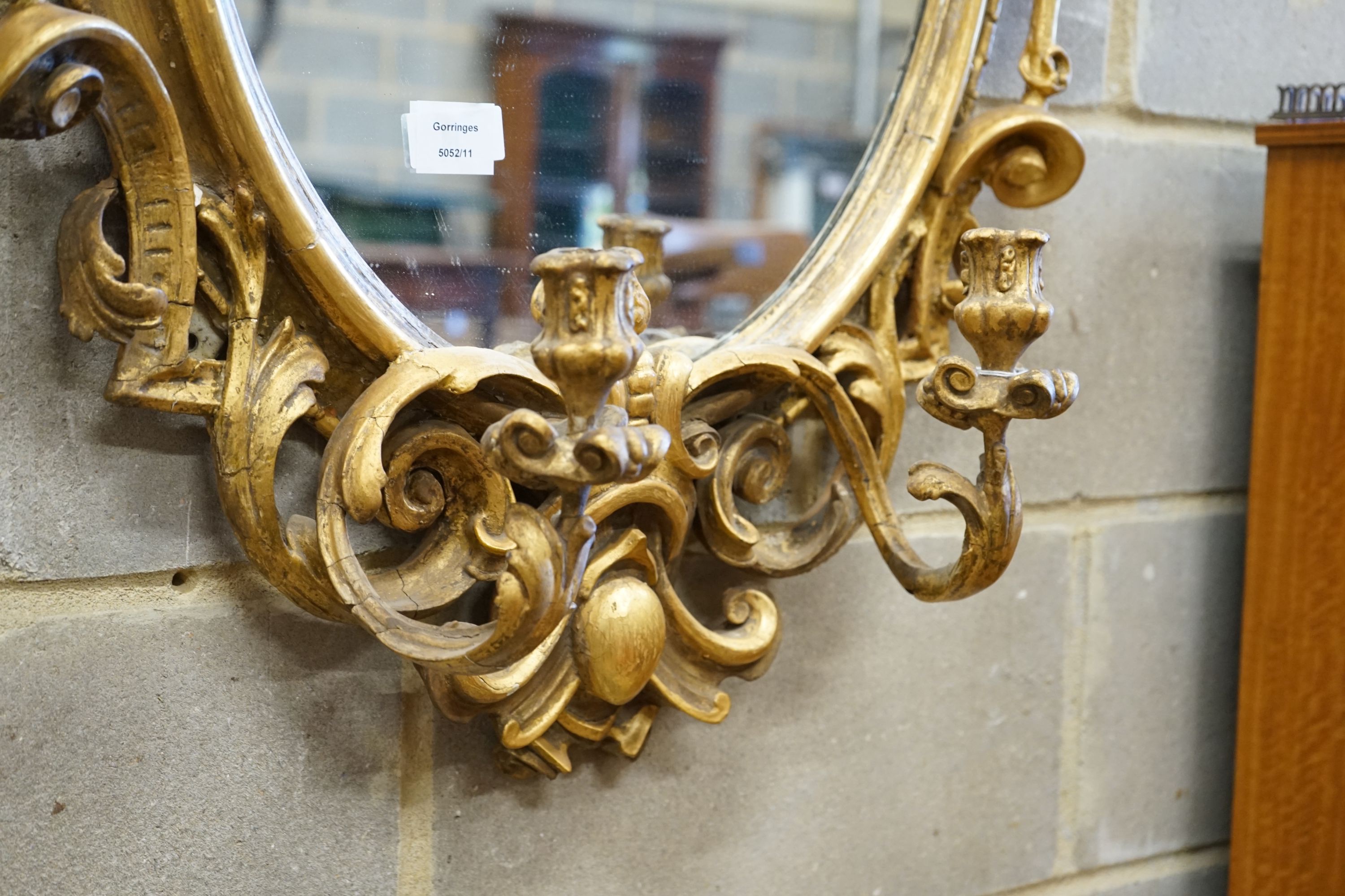 A Victorian giltwood and gesso girandole, width 65cm, height 100cm